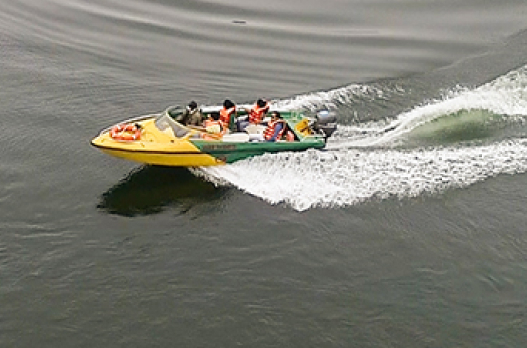 Boating on Banasura Sagar reservoir in Wayanad