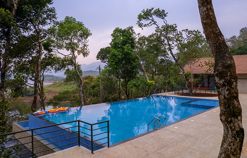 Lakeside swimming pool at Terrace Resorts Wayanad